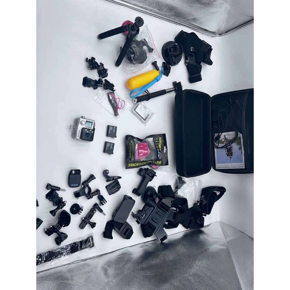 GoPro Hero 4 Silver Action Camera Bundle with Case Mounts and 2 Batteries